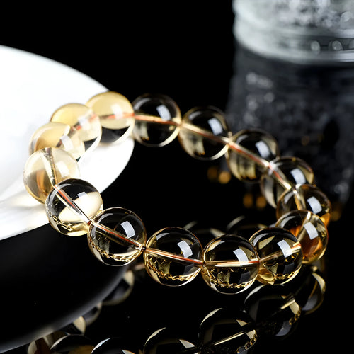 Natural citrine scattered beads ball bracelet showing polished 7A and 6A grade stones in various sizes