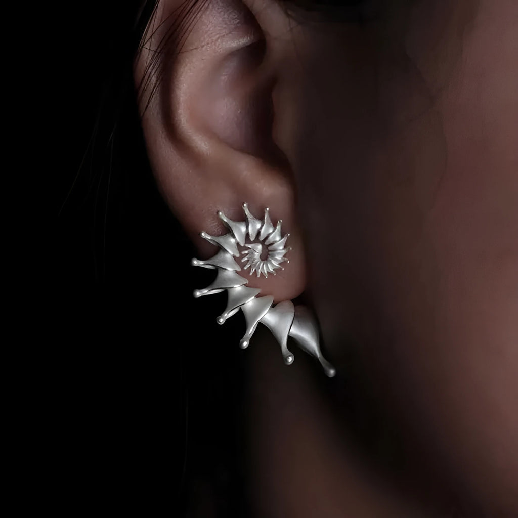 Matte finish conch shell ear studs with three-dimensional design and irregular edges
