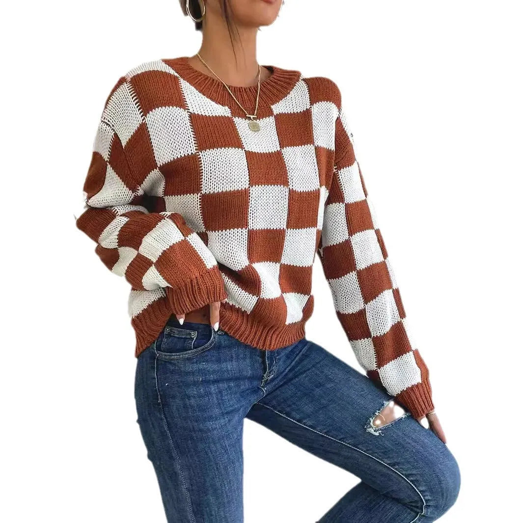 Dark brown plaid pattern loose fit pullover sweater with long sleeves and a round neck.