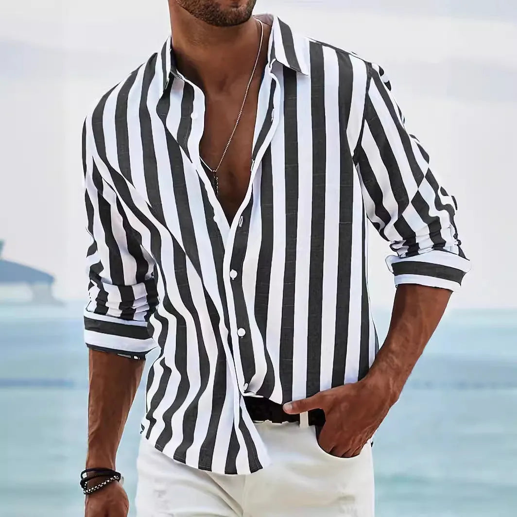 Man wearing a grey and white striped loose-fit long-sleeved casual shirt