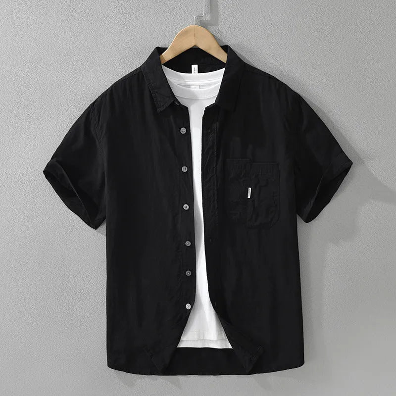 Black loose-fitting lyocell cardigan with artistic design and short sleeves