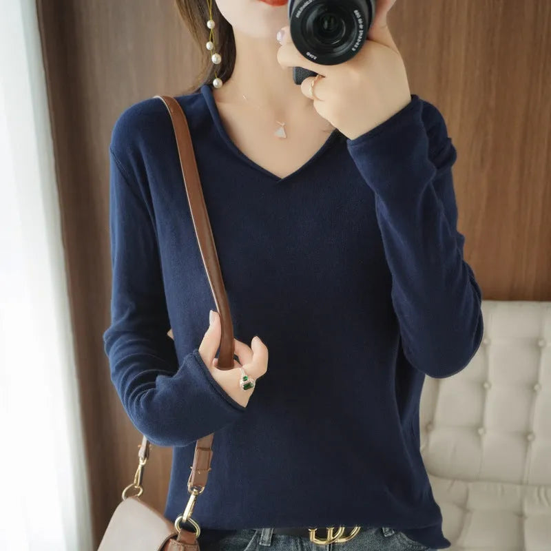 Women's V-neck long sleeve knitwear pullover top in a macaron colour, showcasing non-iron elegant style.