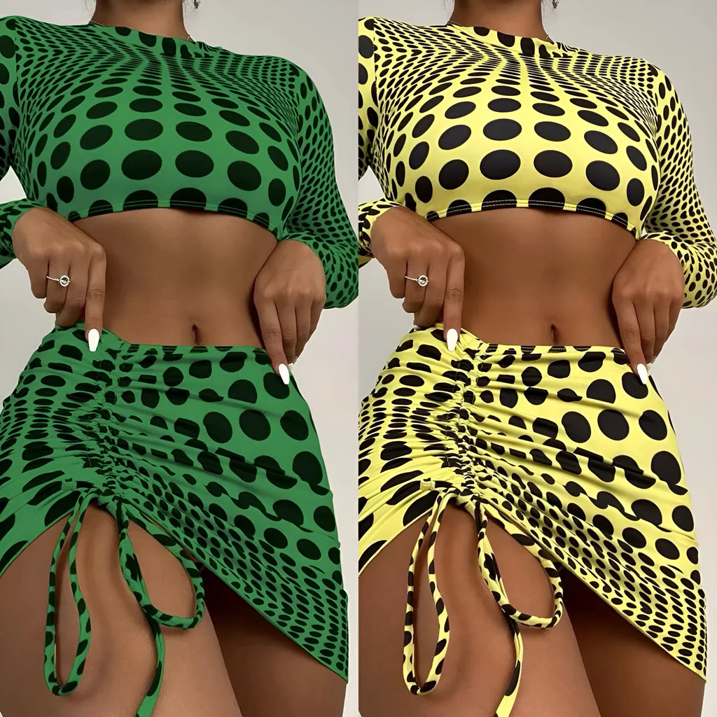 Women's green polka dot three-piece swimsuit set showing bra top and matching skirt