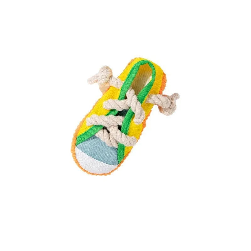 Plastic dog slipper chew toy in yellow, black and blue colours with textured bends for dental cleaning