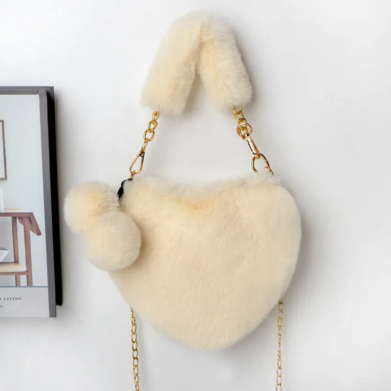 Soft plush heart-shaped women's handbag in medium size with zipper closure