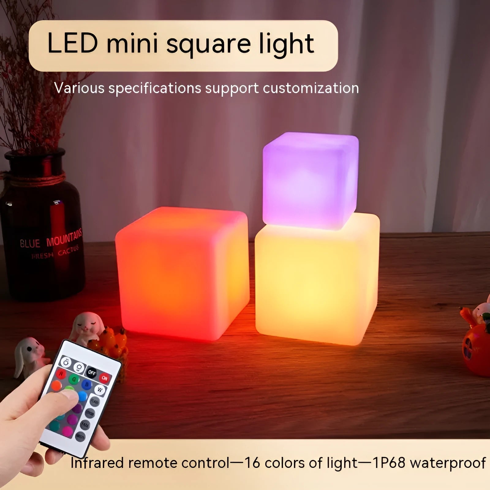Small square night light showing seven colour changing modes, with remote control.