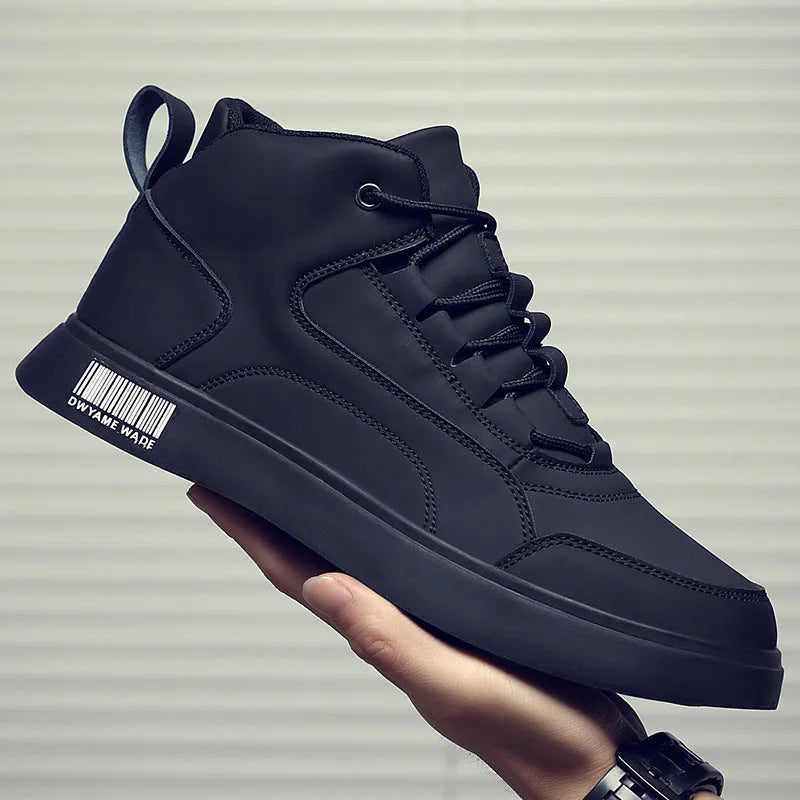 Men's white mid-top board shoes with round toe and flat rubber sole on grey background