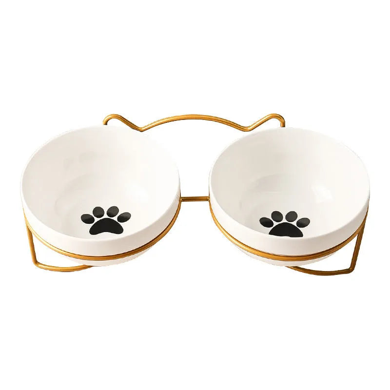 White ceramic pet bowl with decorative pattern in iron frame with cat ear accents