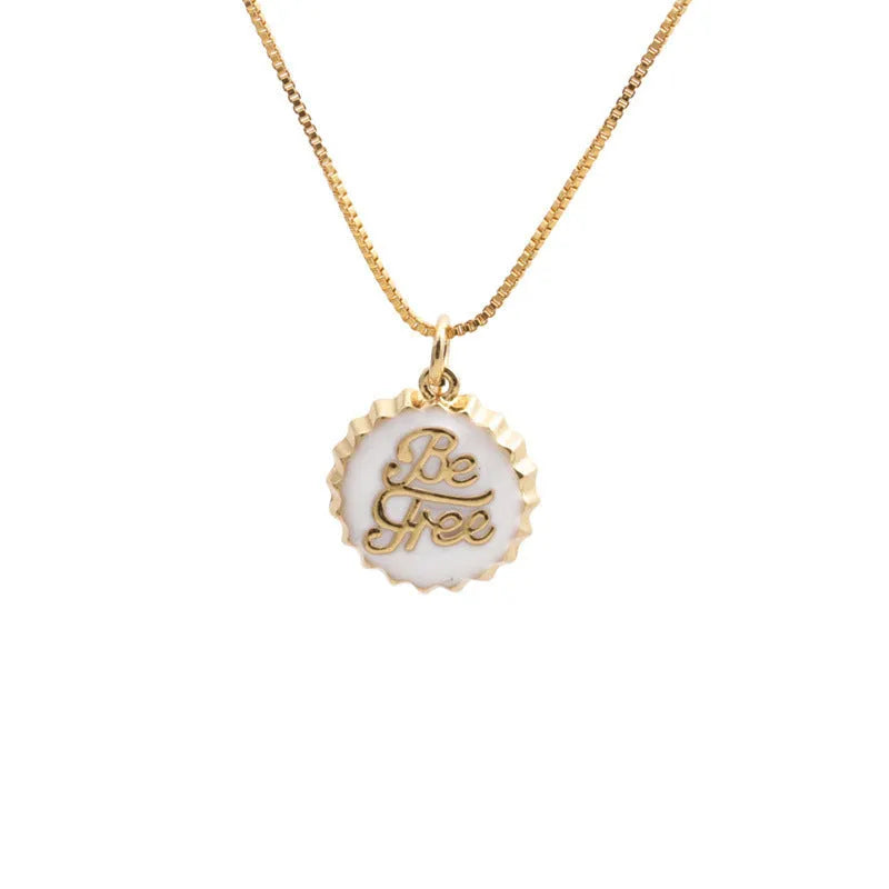 Copper bottle cap pendant necklace with gold plating on a 40cm box chain.
