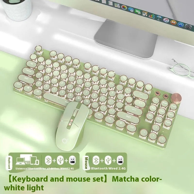 Matcha green mechanical gaming keyboard with white backlighting, aluminium panel, and multifunction knob on desk