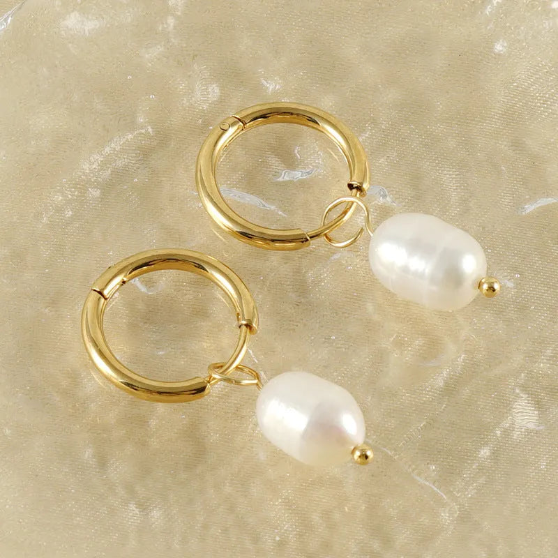Gold coloured stainless steel geometry earrings with pearl decorative elements for women