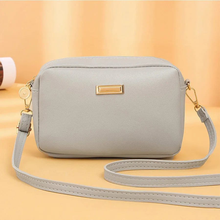 Women's solid colour PU leather shoulder bag with three-dimensional pockets in five colour options
