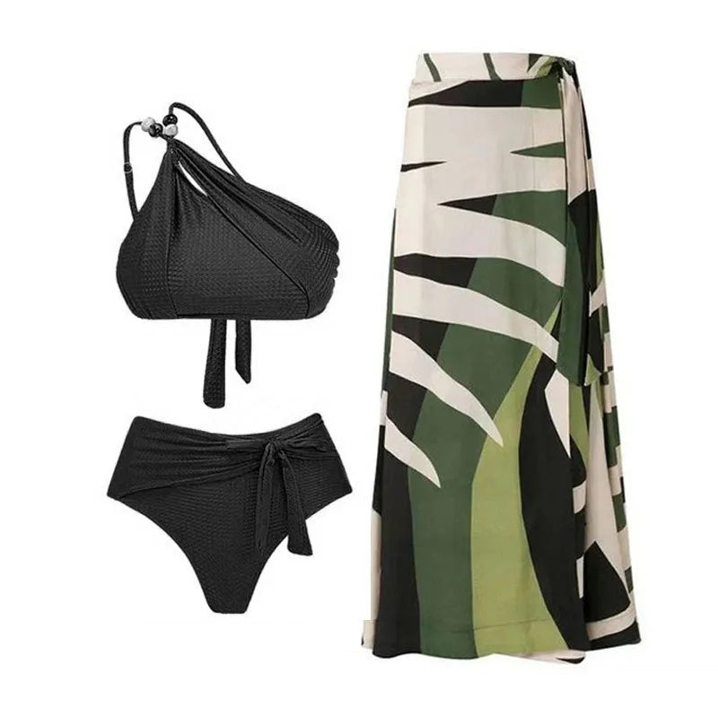 Brown high waist bikini with padded halter top and a sheer black chiffon overdress on a mannequin.
