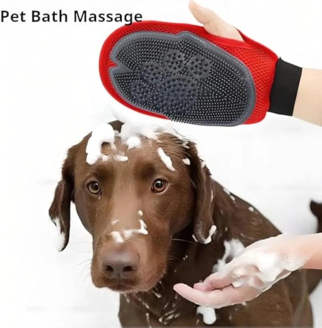 Red pet grooming glove combining a brush and mitt design for bathing dogs and cats.