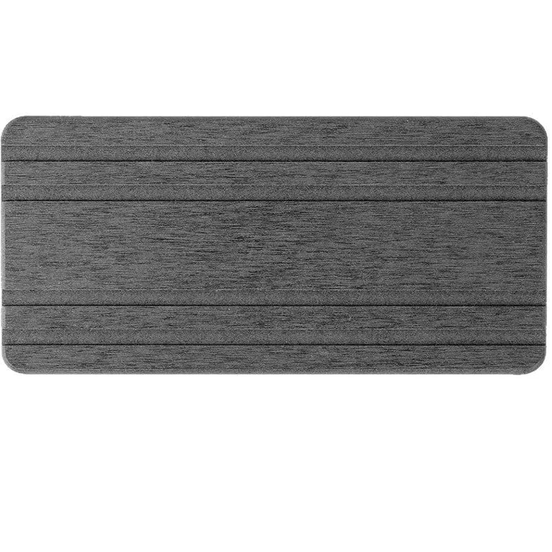 Three square diatom oil bathroom drying mats in solid colour on a countertop