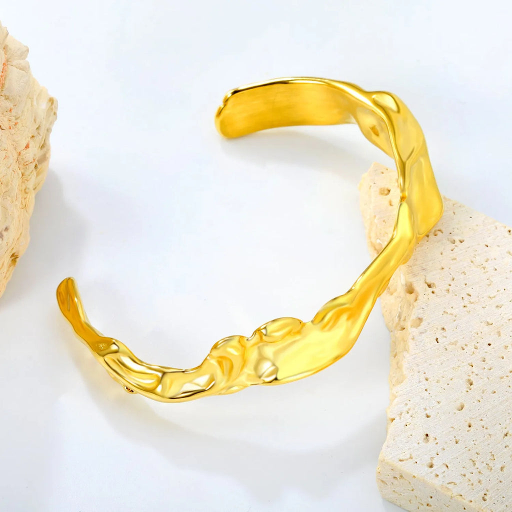 Women's stainless steel adjustable bracelet with alloy detailing in gold and silver tone colour options