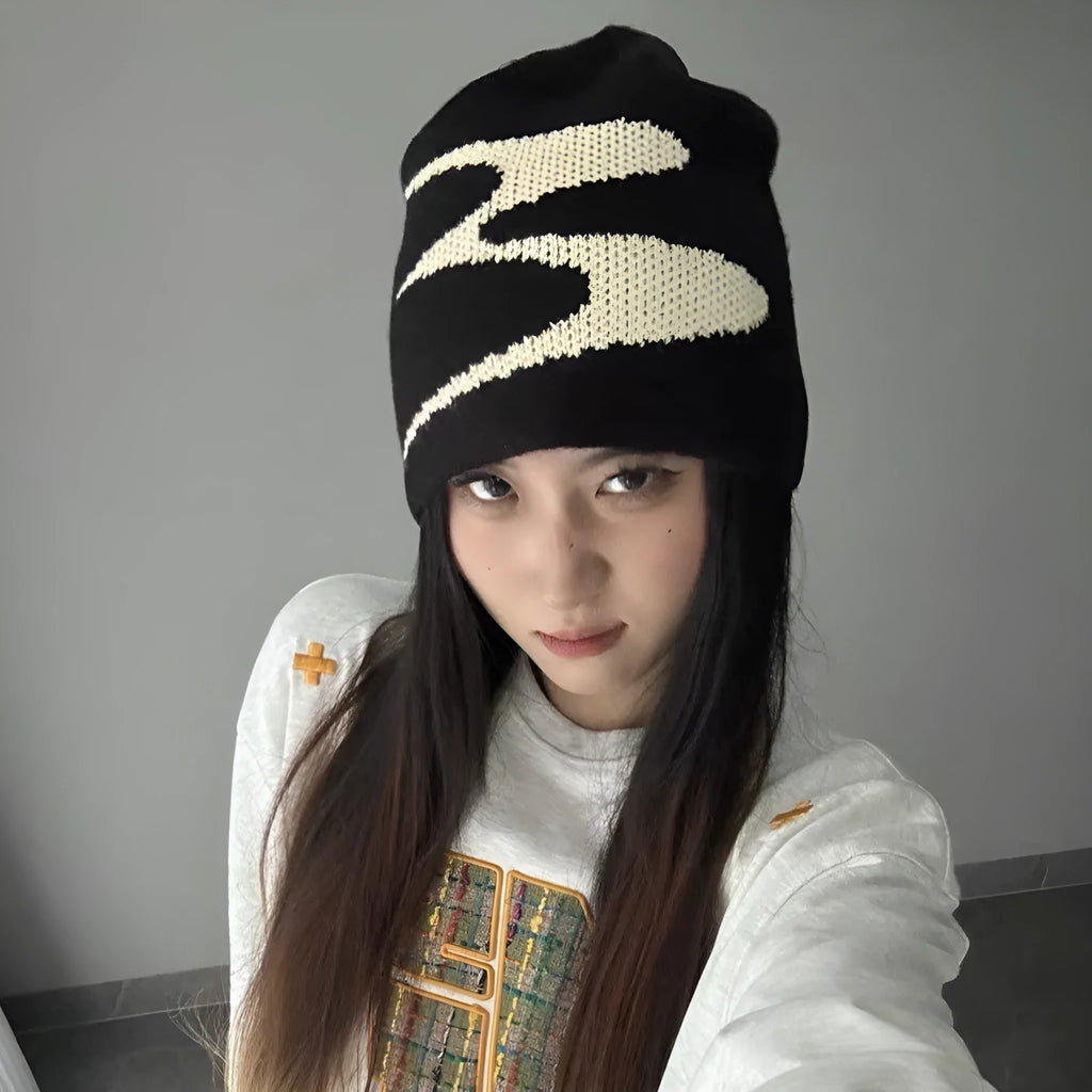 Acrylic knitted beanie hat for men and women in black, grey or white colours with thermal warmth