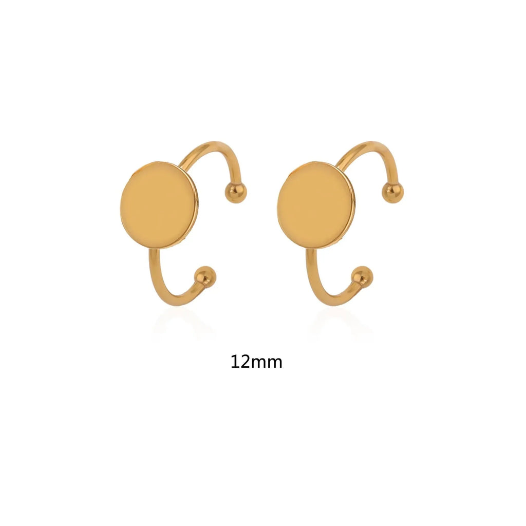 Assortment of golden electroplated stainless steel ring settings and DIY jewellery components in various shapes.