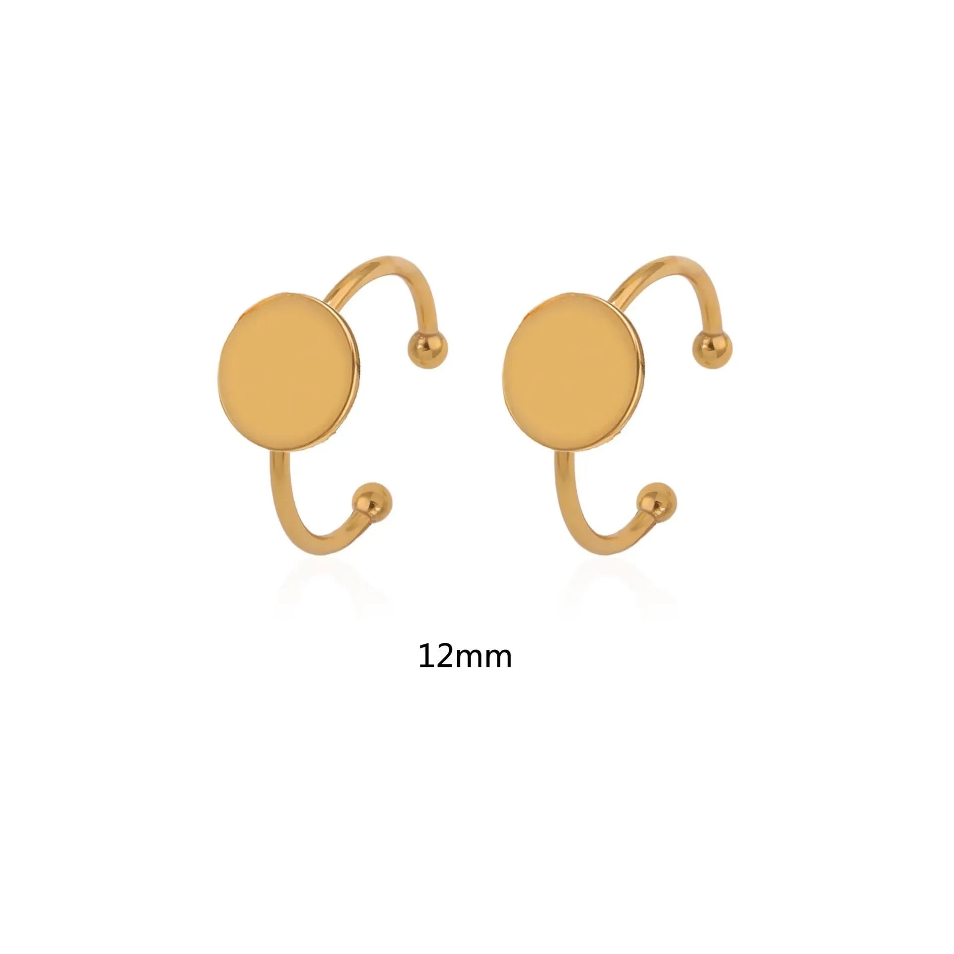 Assortment of golden electroplated stainless steel ring settings and DIY jewellery components in various shapes.