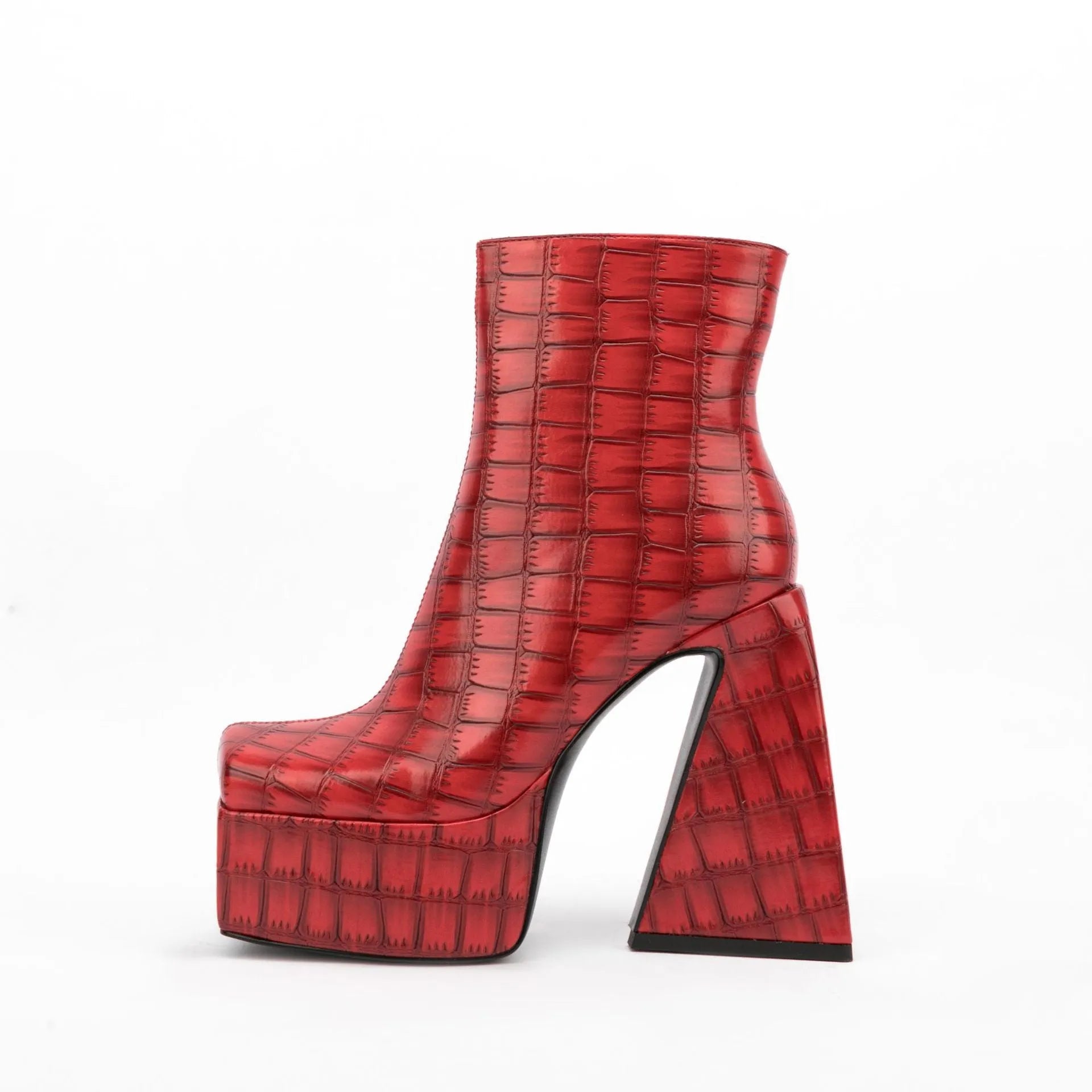 Women's artificial PU ankle boots with a super high heel in beige, shown on a foot.