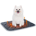 Grey rectangular cloth pet cushion shown in four different sizes on a wooden floor.