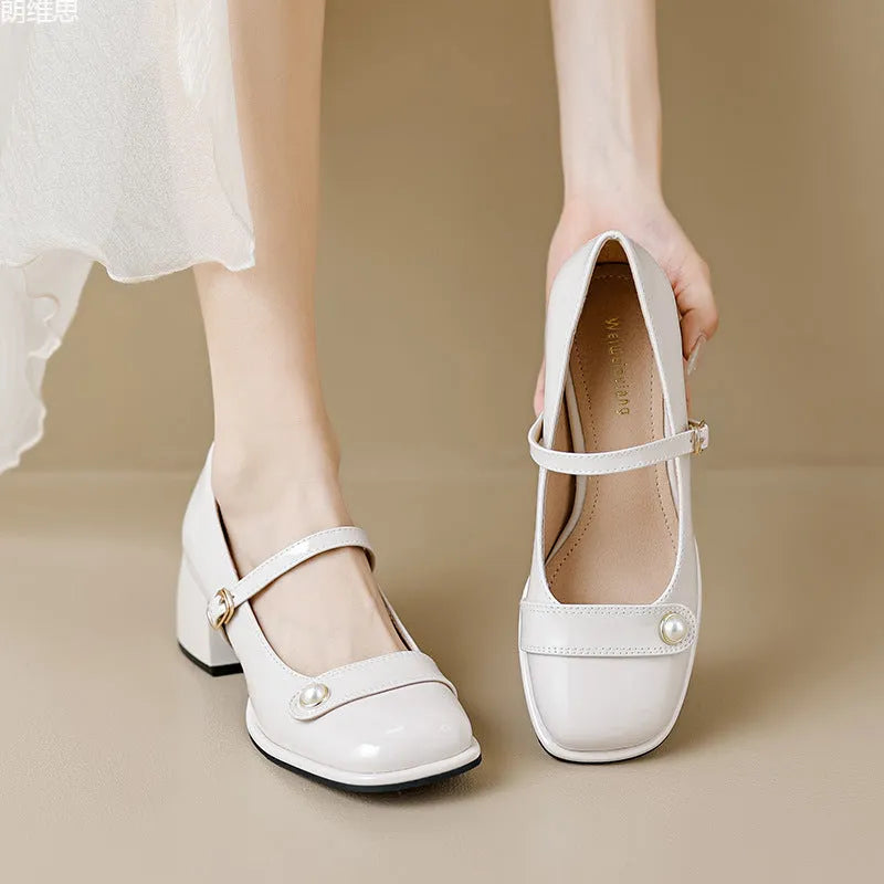 Women's patent leather chunky heel ankle boots with buckle fastening and square toe in three colour options