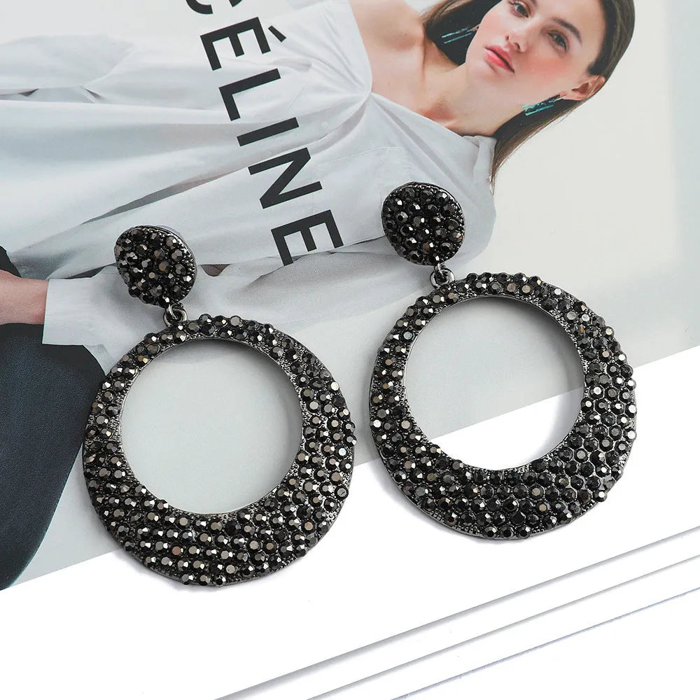 Large round pendant earrings with colourful diamond cartoon designs on metal alloy