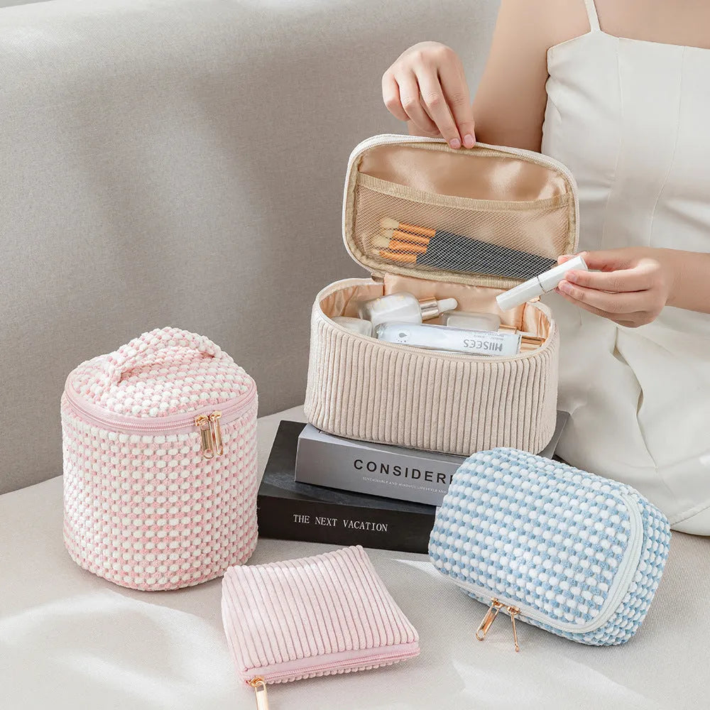 Four-piece flannelette makeup bag set in cube style design with polyester material