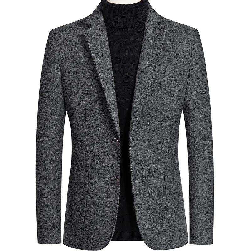 Men's slim-fit wool suit jacket in grey, shown on a hanger.