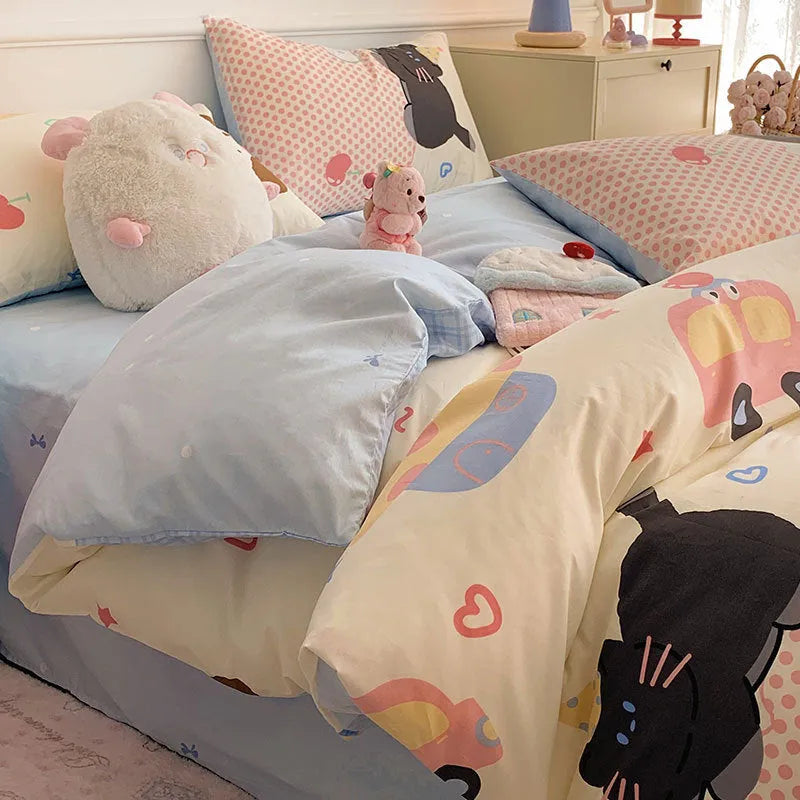 Cartoon dog pattern cotton bedding four-piece set shown on bed with reactive printed designs