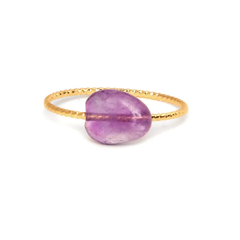 Original geometric women's agate ring on a hand, showing unique stone banding in one of eight colour options.