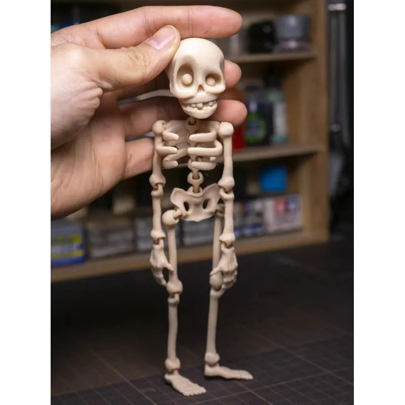 3D printed PLA skull ornament refrigerator magnet in assorted colours, 18cm high.