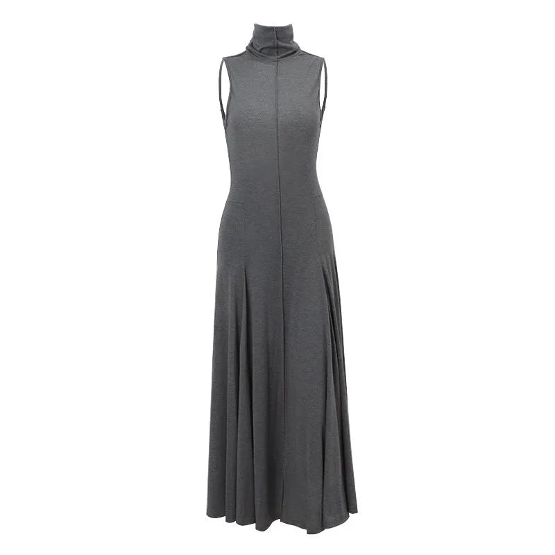 Grey women's slim-fit cotton dress with half turtleneck neckline and backless design.