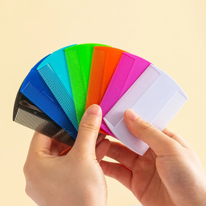 Fine teeth plastic flea comb for lice removal in various colours on a white background.