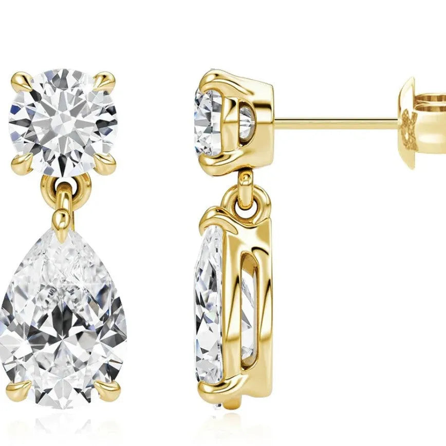 Women's sterling silver geometric stud earrings with round and water drop moissanite stones.