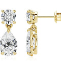 Women's sterling silver geometric stud earrings with round and water drop moissanite stones.