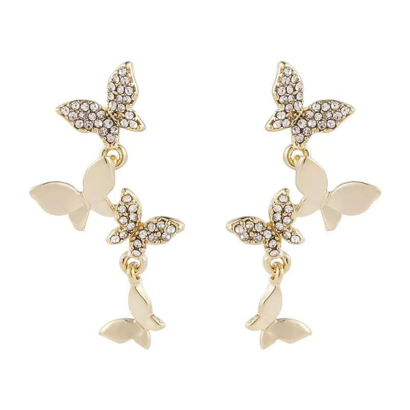Women's copper butterfly earrings with four motifs and gold-plated drops