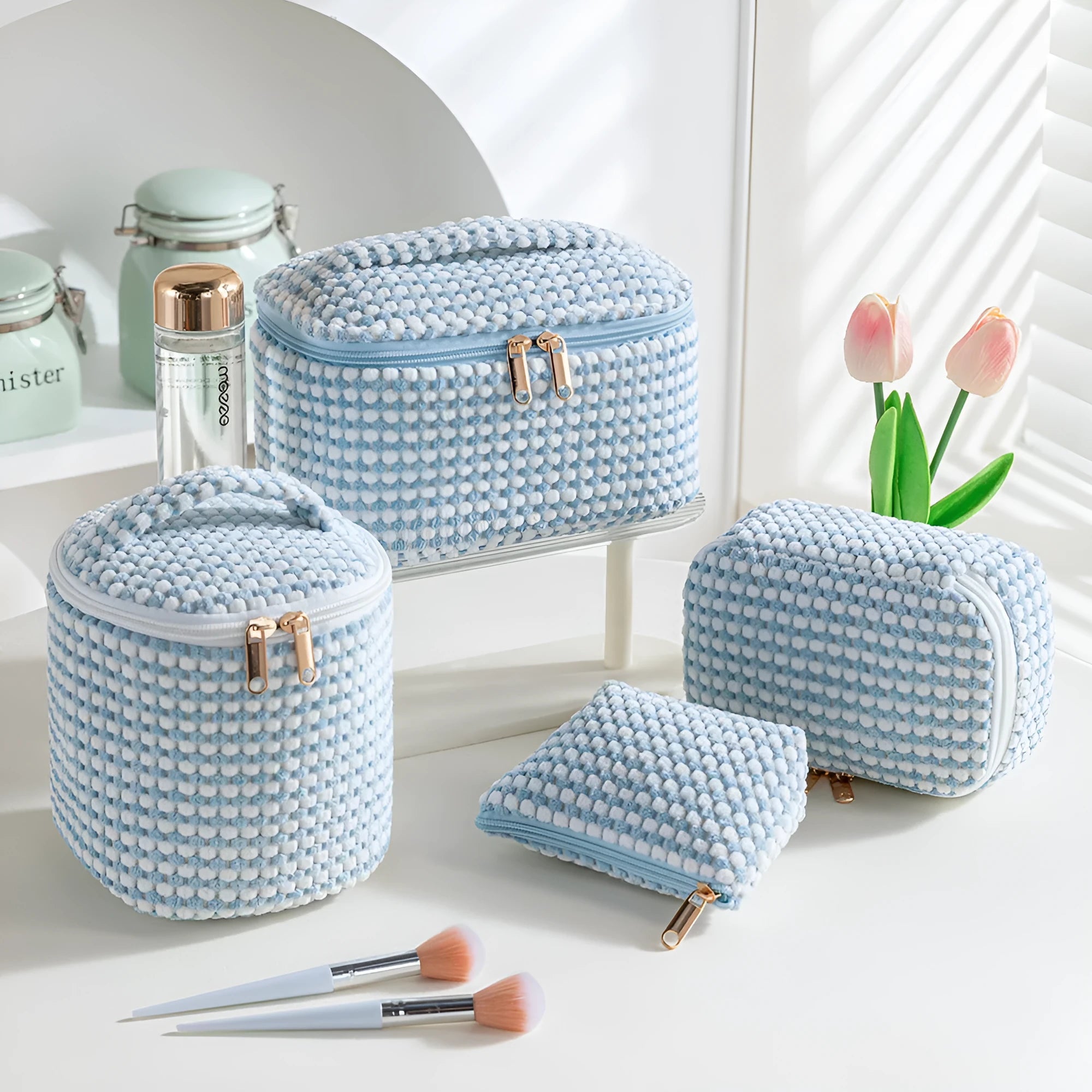Four-piece flannelette makeup bag set in cube style design with polyester material