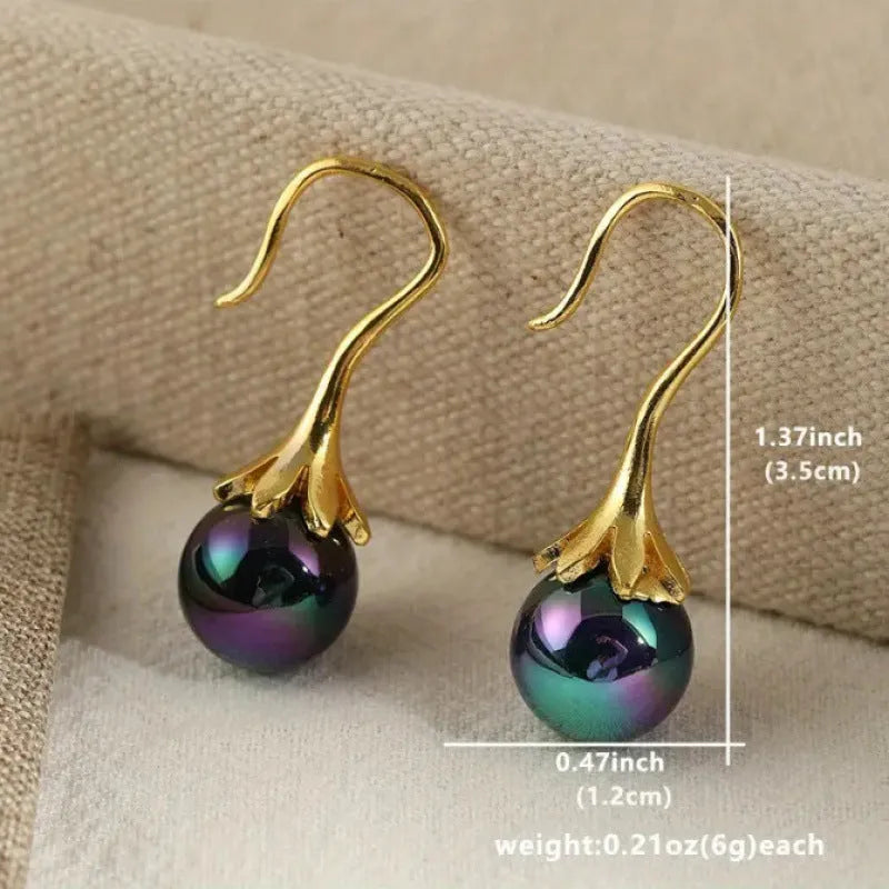 Retro fashion women's earrings with imitation gold electroplated finish and personalised creative design