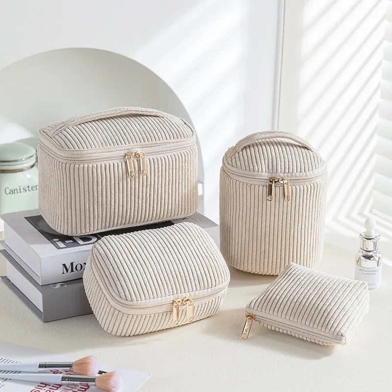 Four-piece flannelette makeup bag set in cube style design with polyester material