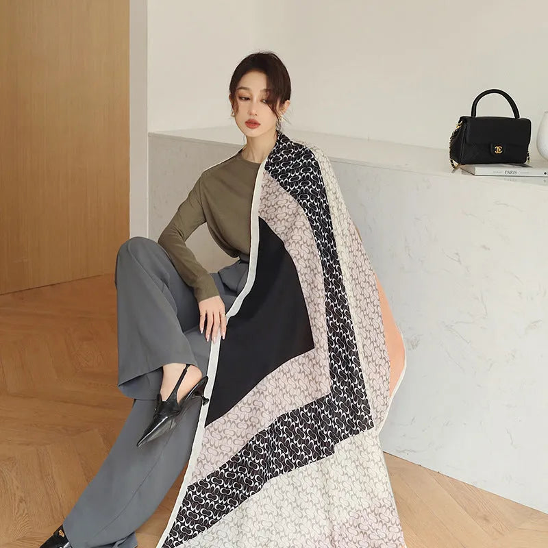 Elegant printed polyester scarf for women, shown in a style option, measuring 90cm by 180cm.