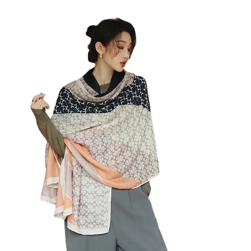Elegant printed polyester scarf for women, shown in a style option, measuring 90cm by 180cm.