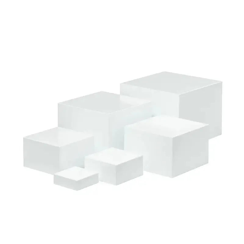 White plastic six-piece stacking dessert table display stand set for tiered bakery presentation