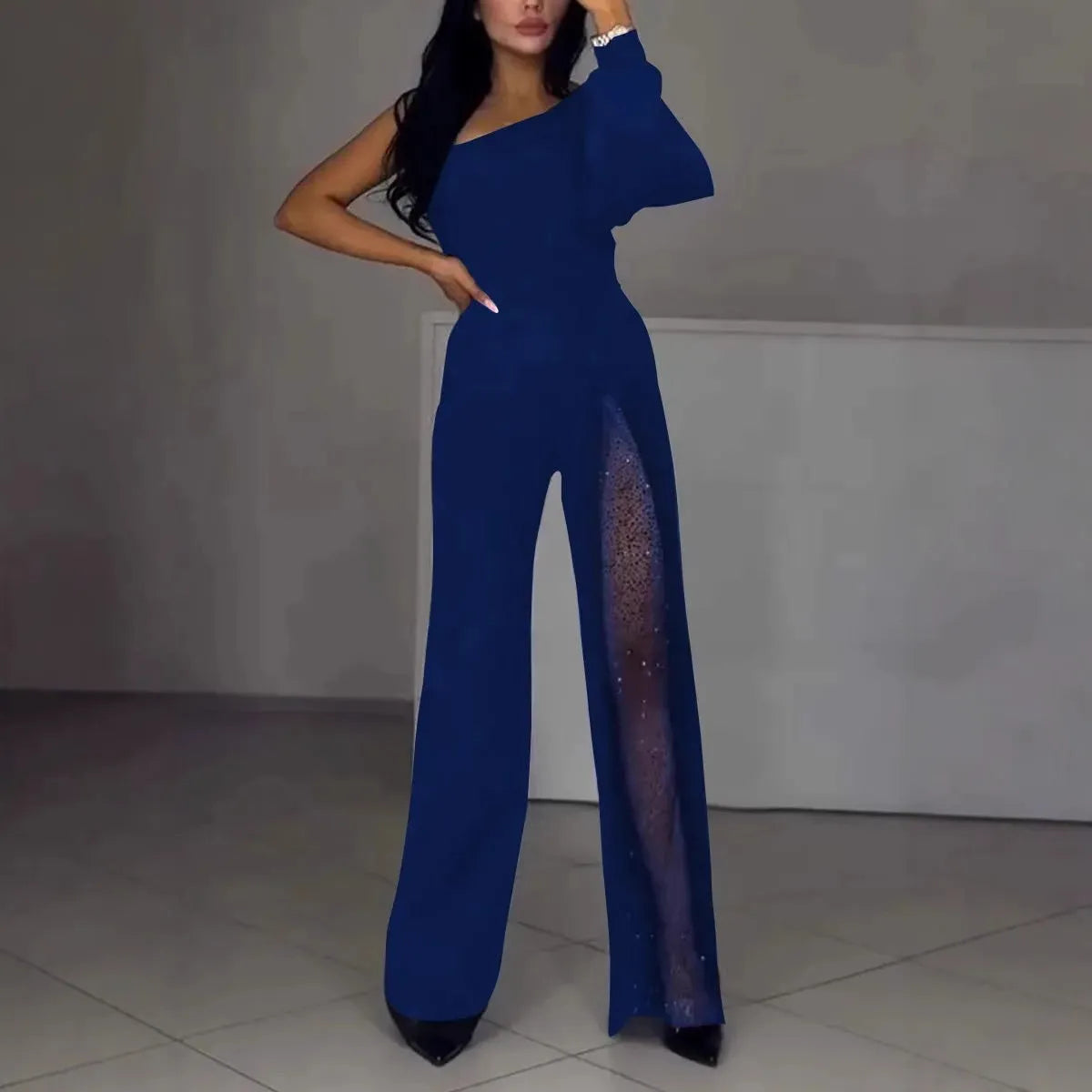 Women's black polyester jumpsuit with oblique shoulder neckline and high slit leg detailing