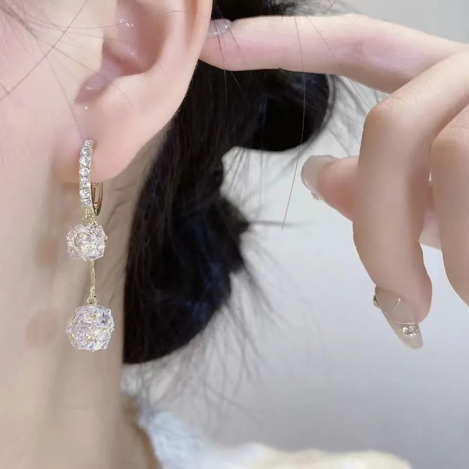 Silver drop shape earrings with tassel ball, rhinestone ball, and confession balloon pendant design