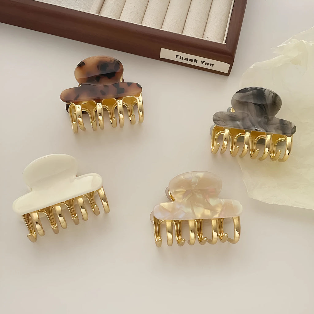 Women's retro acetate barrettes with metal grip in beige, white, ink, or leopard print colours