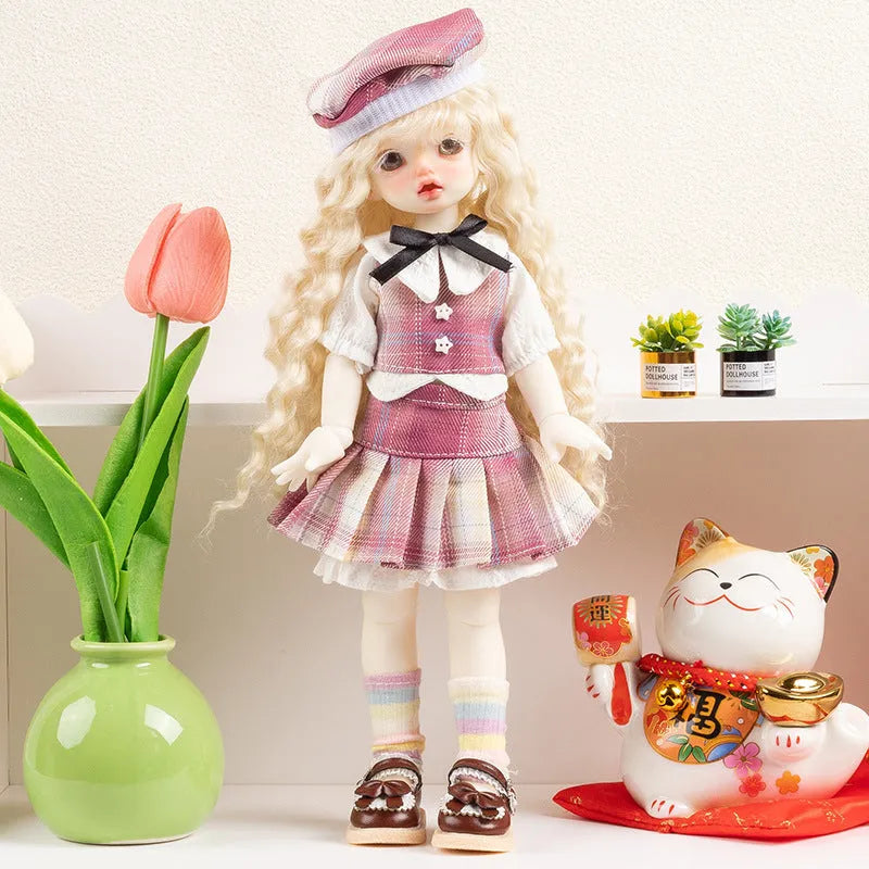 Printed cloth doll clothes for fashion dolls in various colourful patterns sold separately without dolls