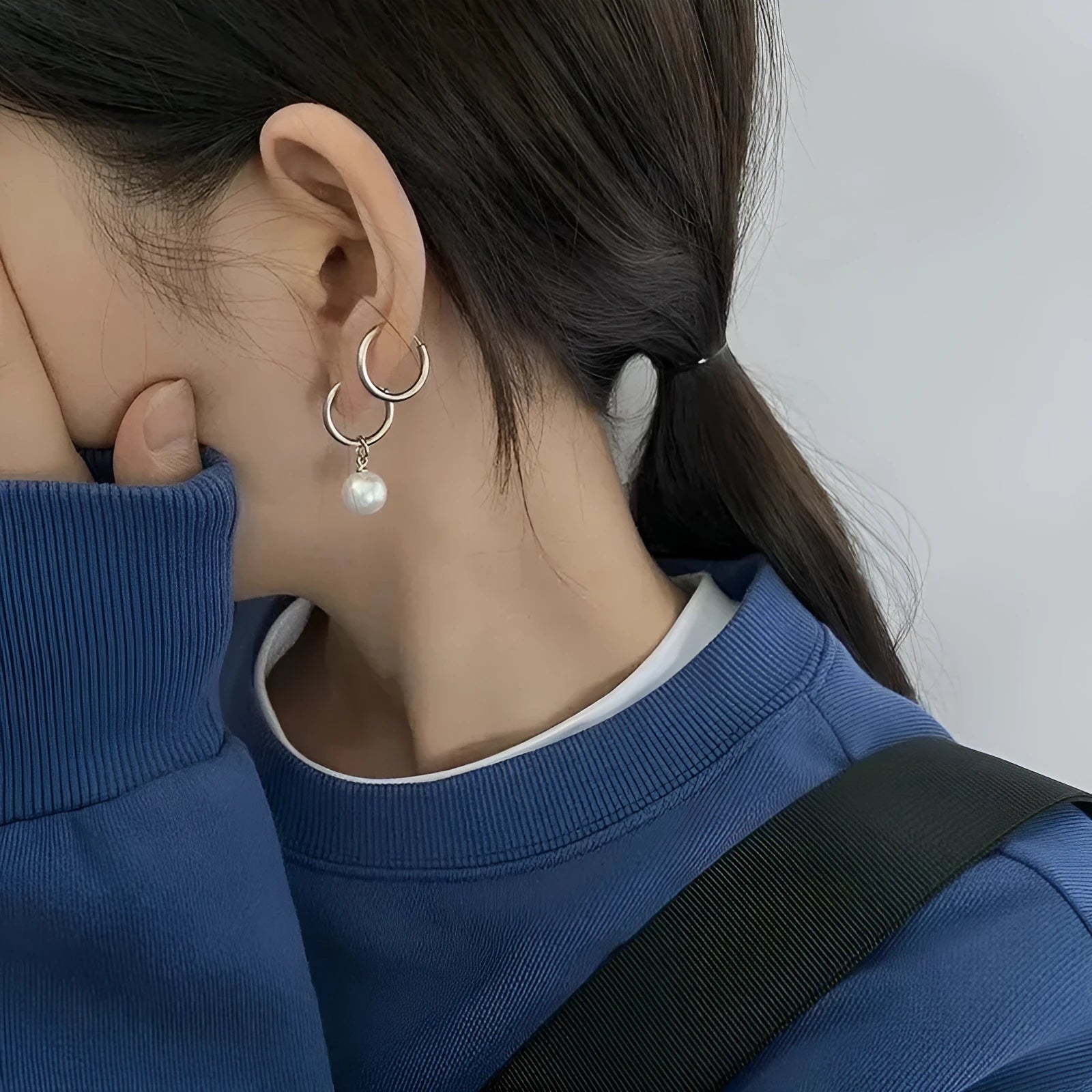 Pearl drop earrings with geometric alloy shape and titanium steel posts