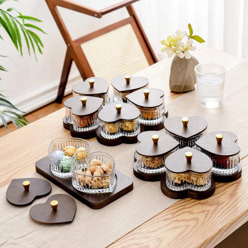 Glass fruit platter with coloured glaze and transparent heart-shaped lids in a 4-grid configuration.