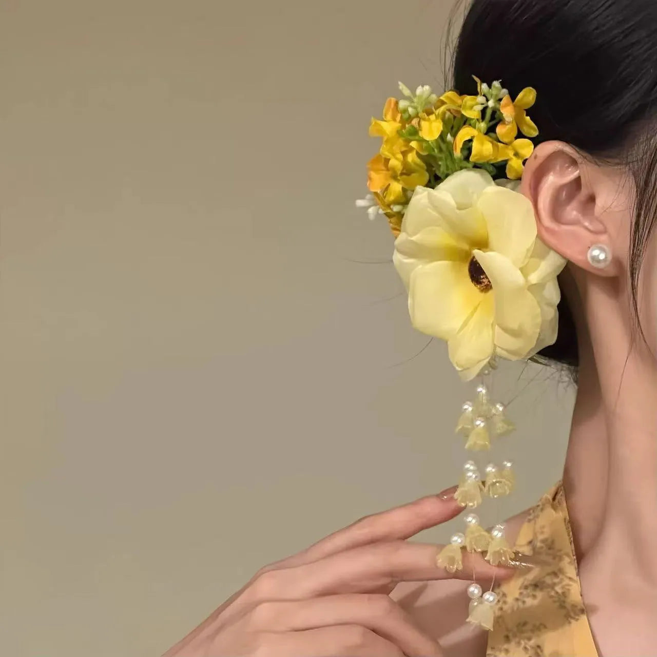 Handmade floral tassel side clip hair accessory with pearl accents in yellow or purple